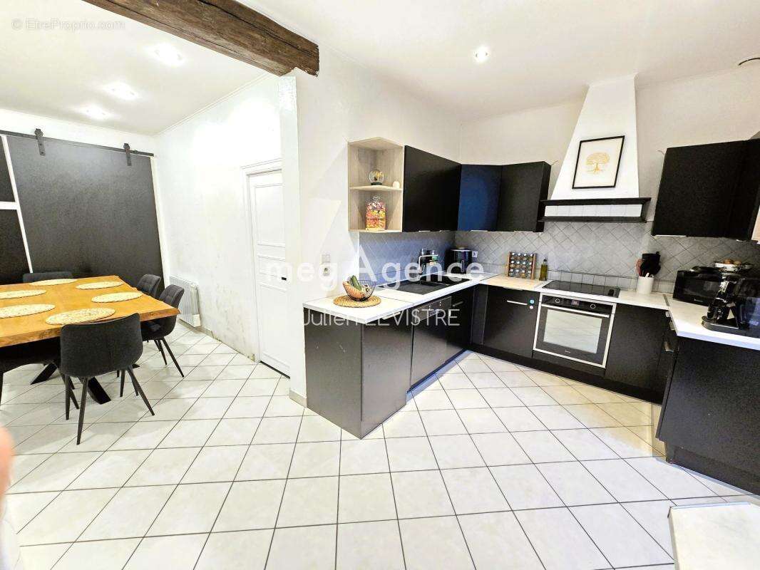 Maison de 4 pièces de 102m² - photo 4