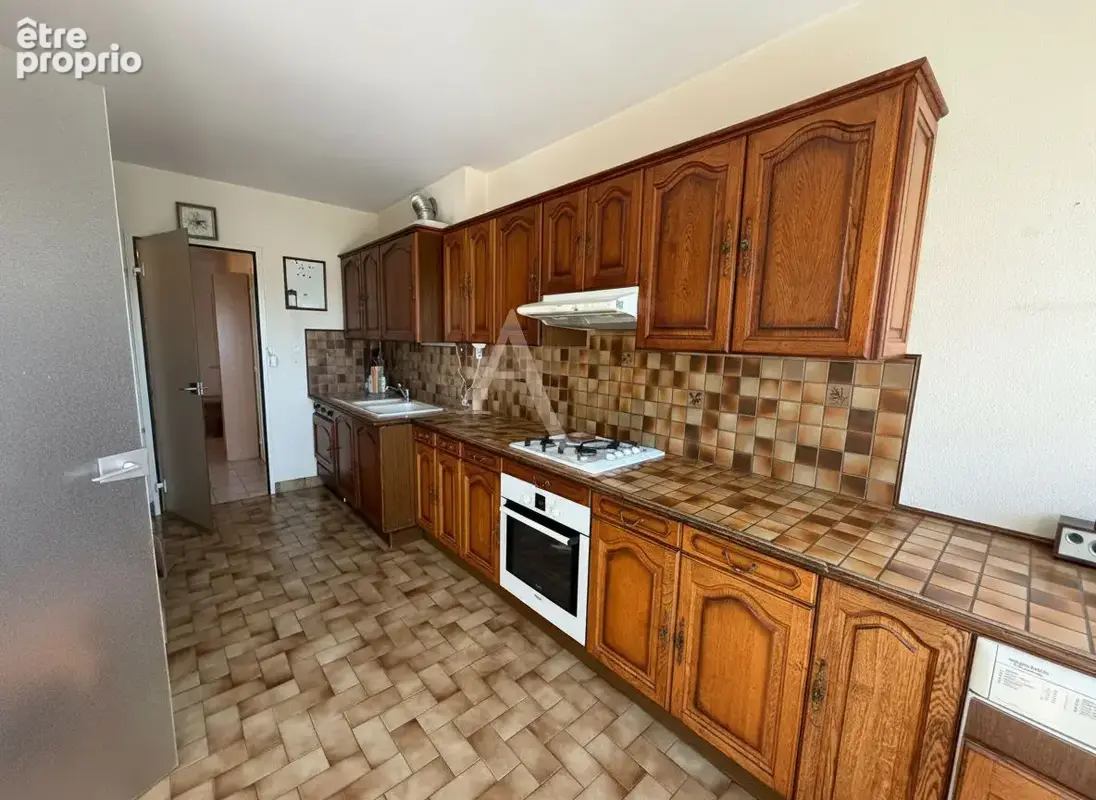 Appartement T4 de 87 m² avec terrasse, 2 caves + stationnement - photo 4