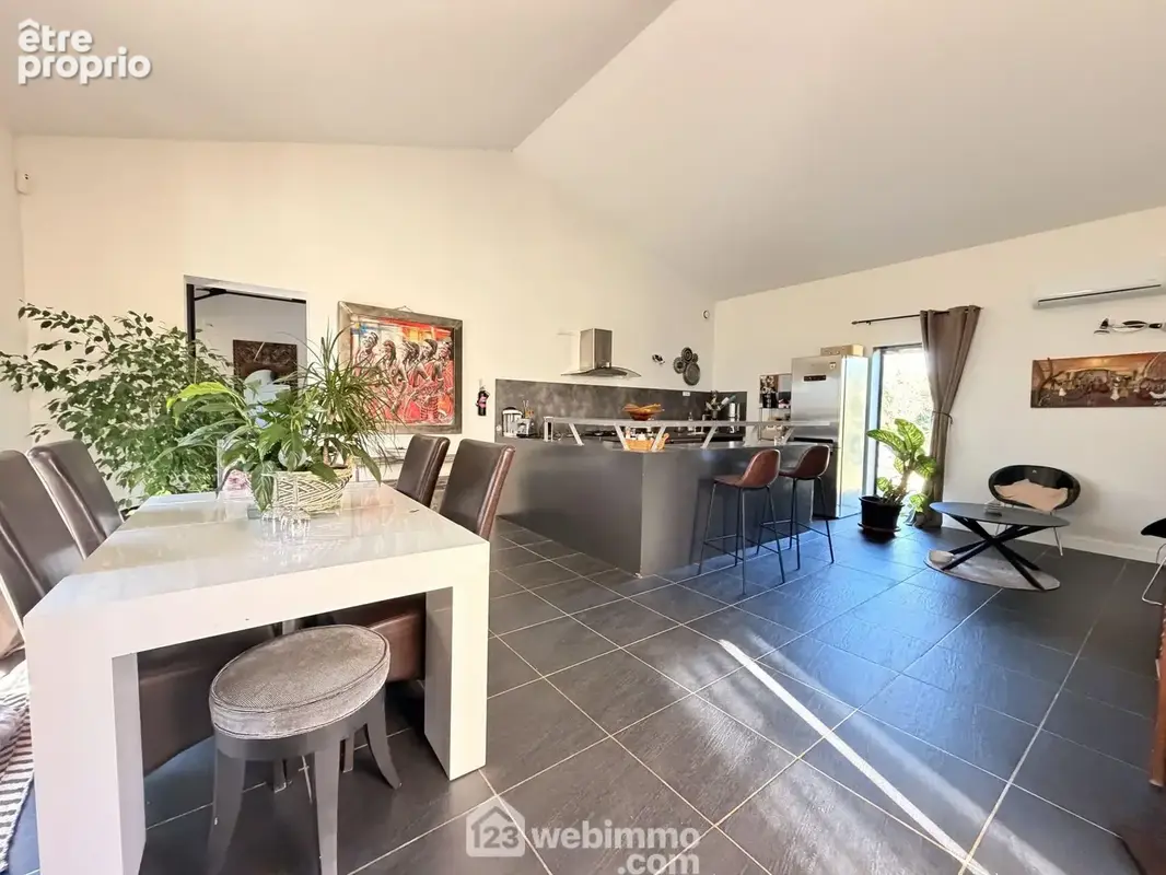 Un espace convivial de 38 m² comprenant ...