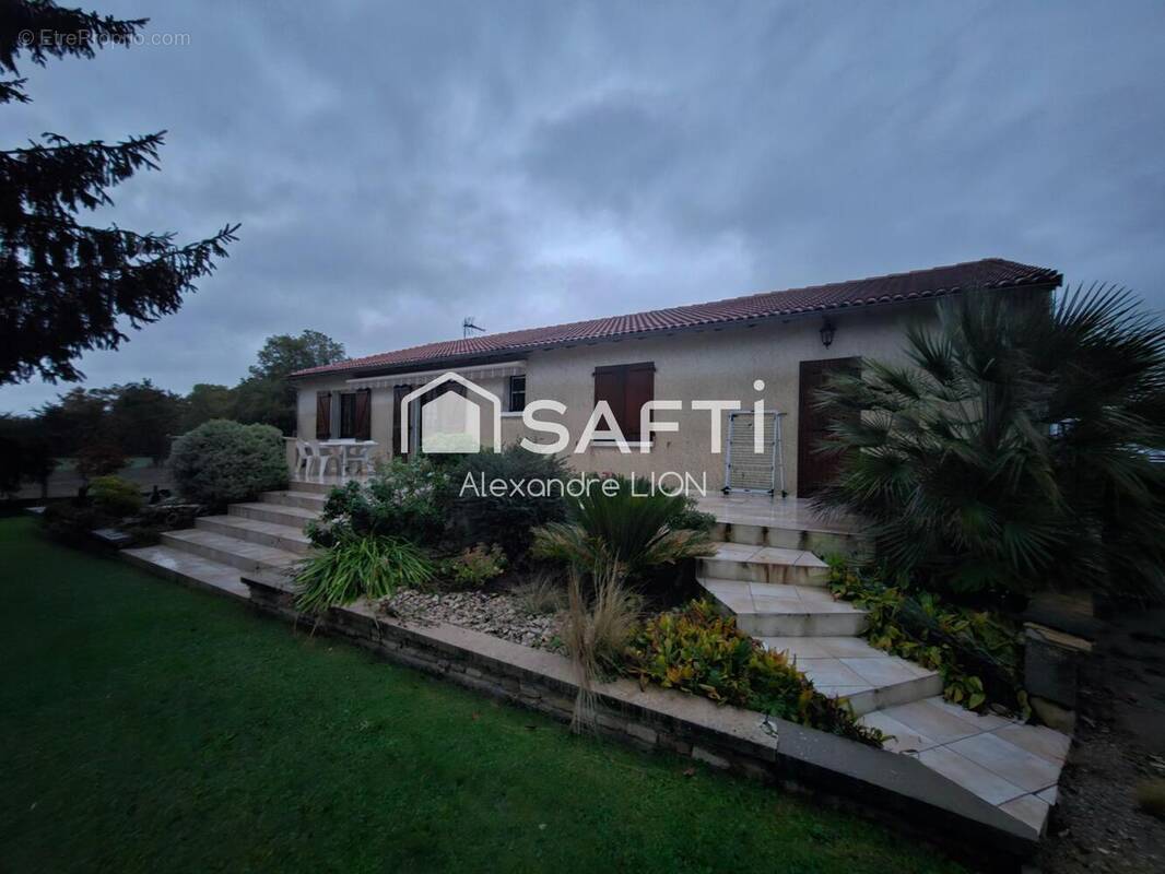 Photo 1 - Maison à SAINT-MARTIN-DE-BERNEGOUE