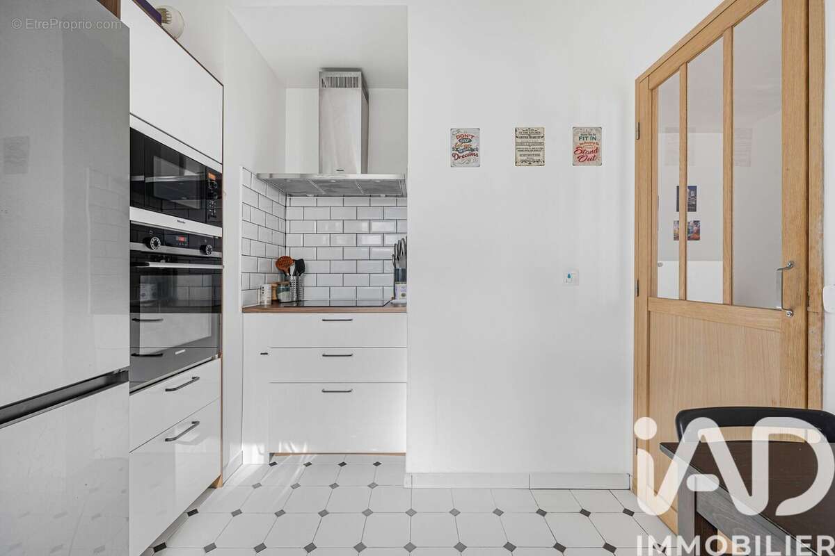 Photo 9 - Appartement à COURBEVOIE