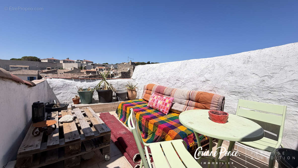 Nimes centre appartement 52 m2 dernier etage terrasse privative propose par corinne ponce immobilier - photo 12
