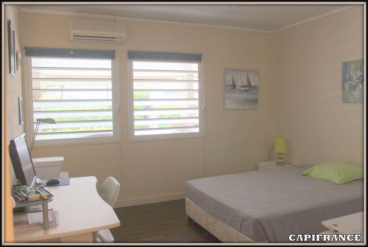 A vendre a kourou (97310) une magnifique maison en bois t5 de 106 m² avec 2 maisons t2 independantes - terrain de 775 m² - au pr - photo 10
