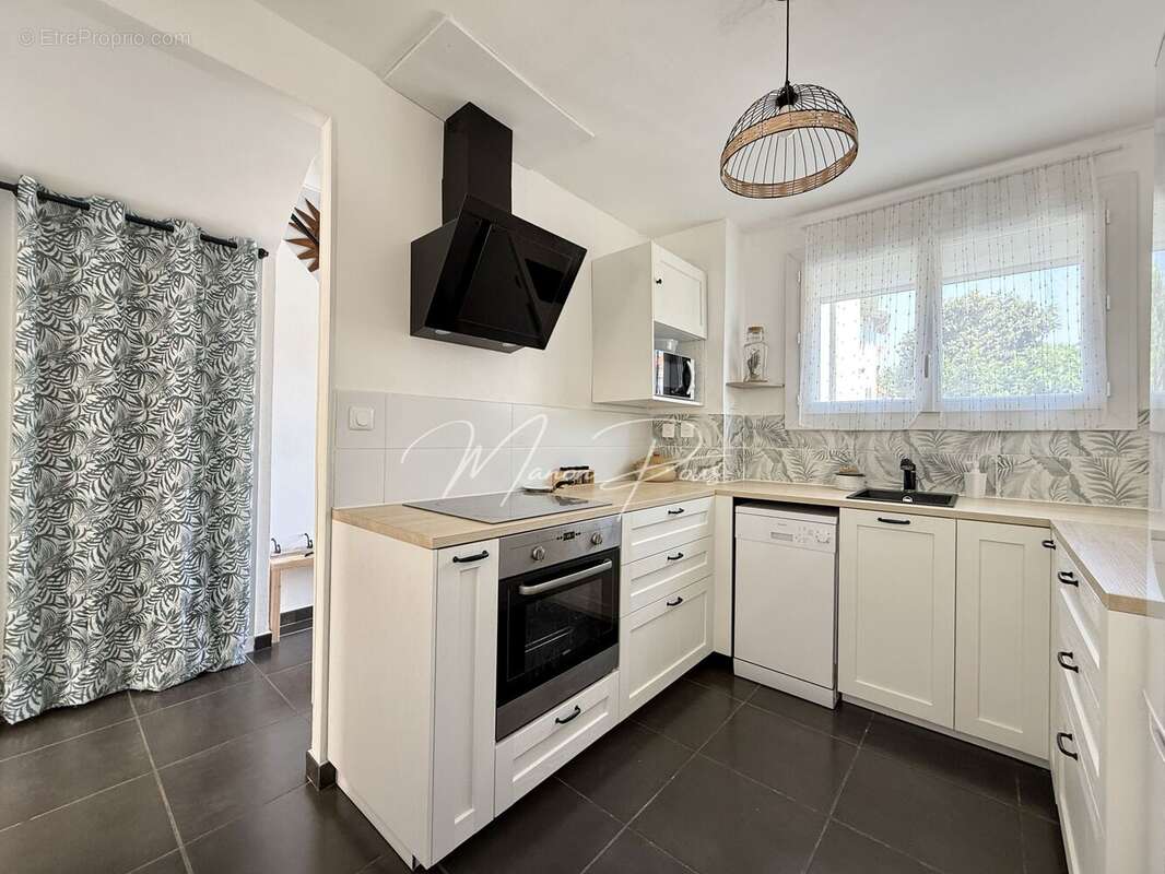 Maison 95 m² à Saint-Esteve  - photo 13