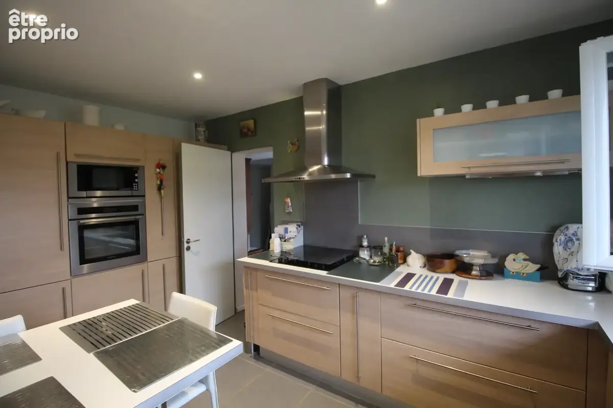A vendre - Maison de plain pied de 146 m² - garage aménagé - photo 6