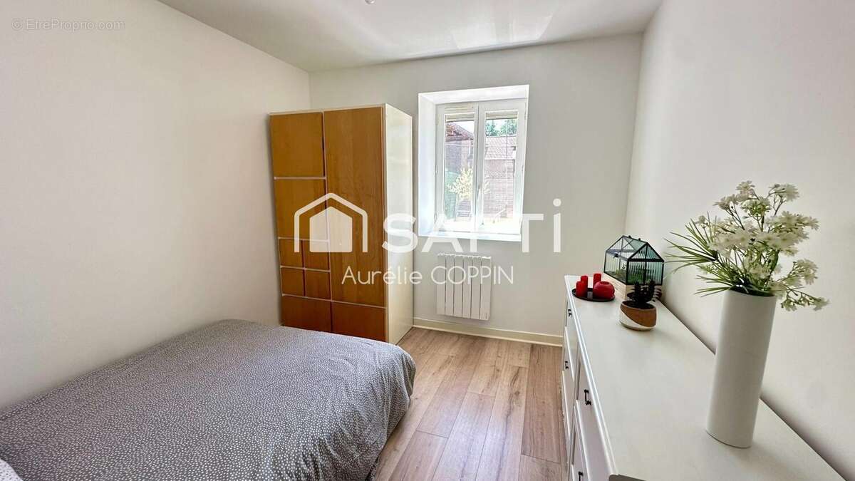 Photo 8 - Appartement à SAINT-ROMAIN-DE-JALIONAS