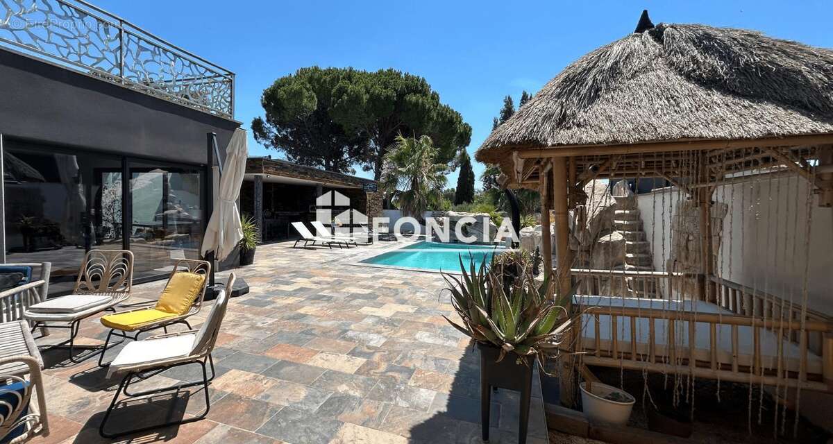 Aigues mortes. villa d'exception – 318 m² – prestations haut de gamme – studio indépendant – piscine - photo 3