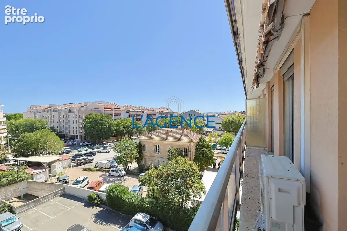 Appartement T4 de 91 m2 en étage avec ascenseur et parking privatif en plein coeur du centre ville - photo 7