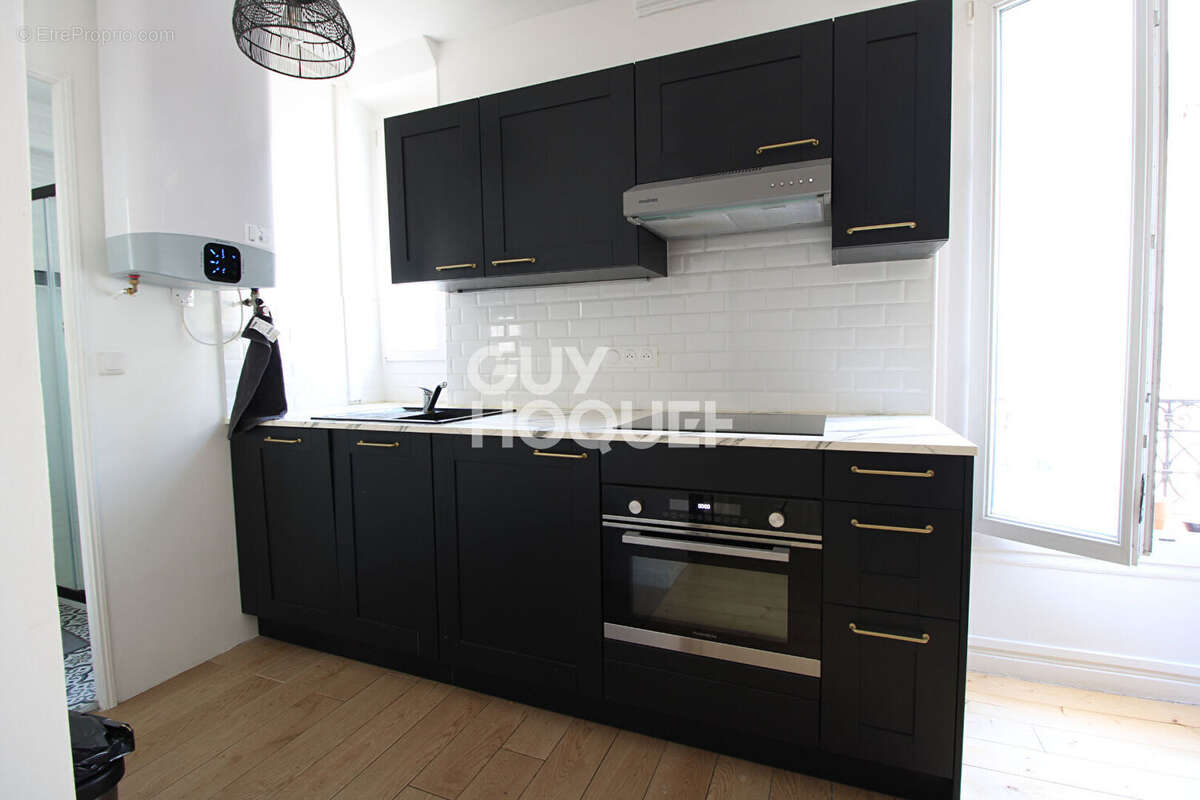Appartement 2 pièces Ménilmontant refait à neuf - photo 8