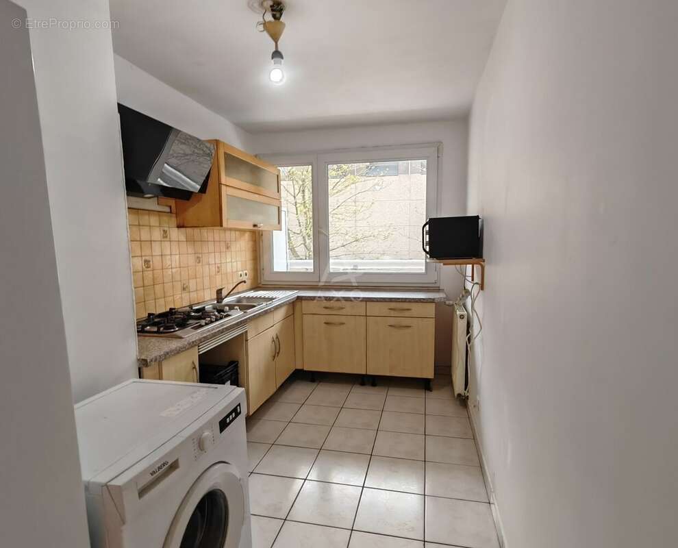 Appartement F5 au 1er étage 4 chambres 2 parkings - photo 5