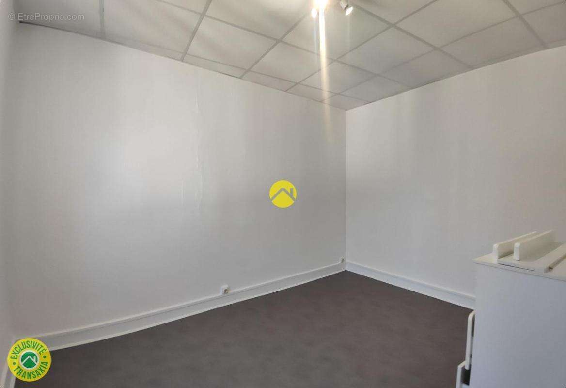 Immeuble de rapport en centre-ville - photo 11