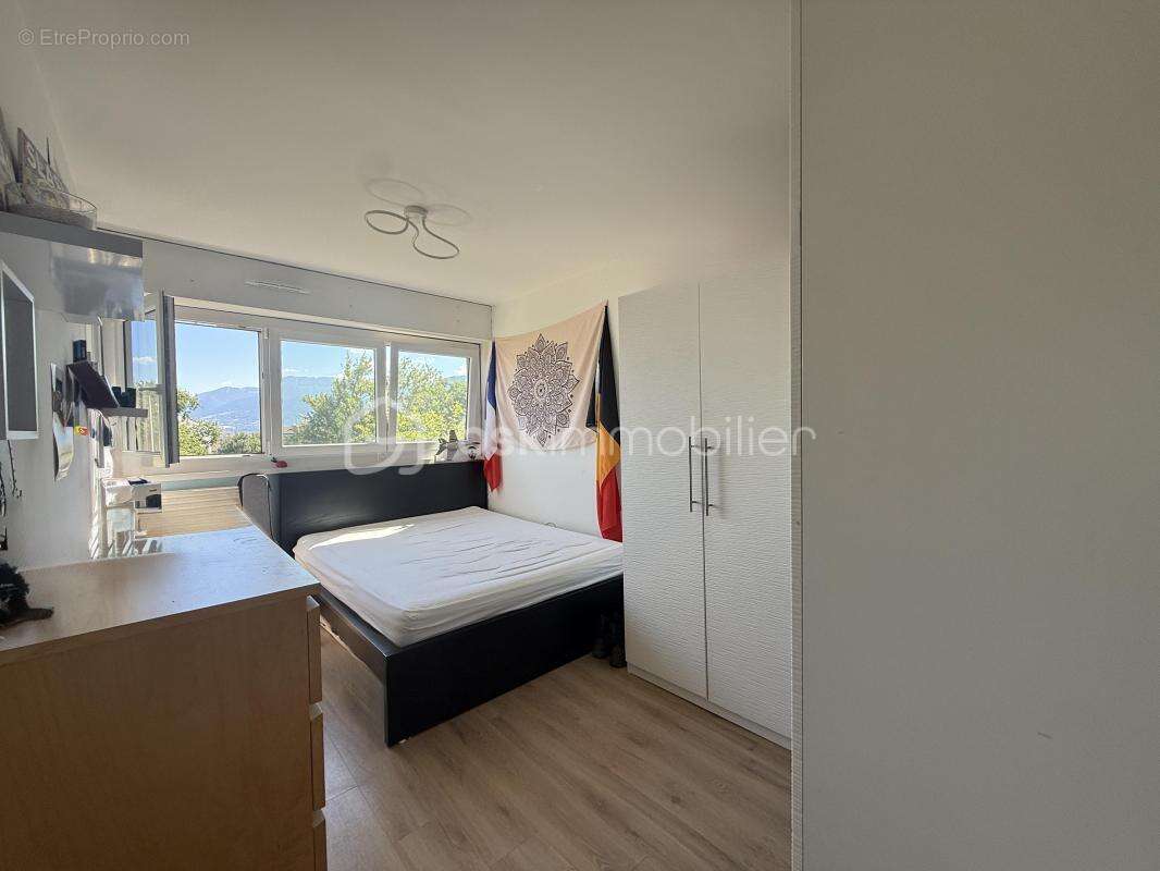 Appartement 4 pièces avec balcon, cave et parking sécurisé - Seynod - photo 12