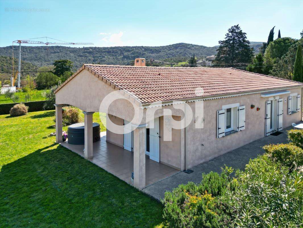 Maison À Vendre sur 1500m² de terrain arboré - photo 21
