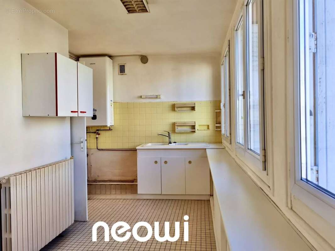 Appartement T3 à rafraichir - garage et cave - photo 4