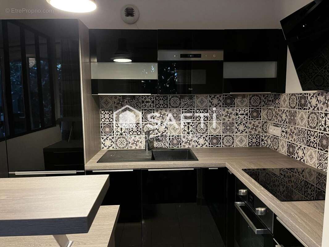 Photo 5 - Appartement à ISSY-LES-MOULINEAUX