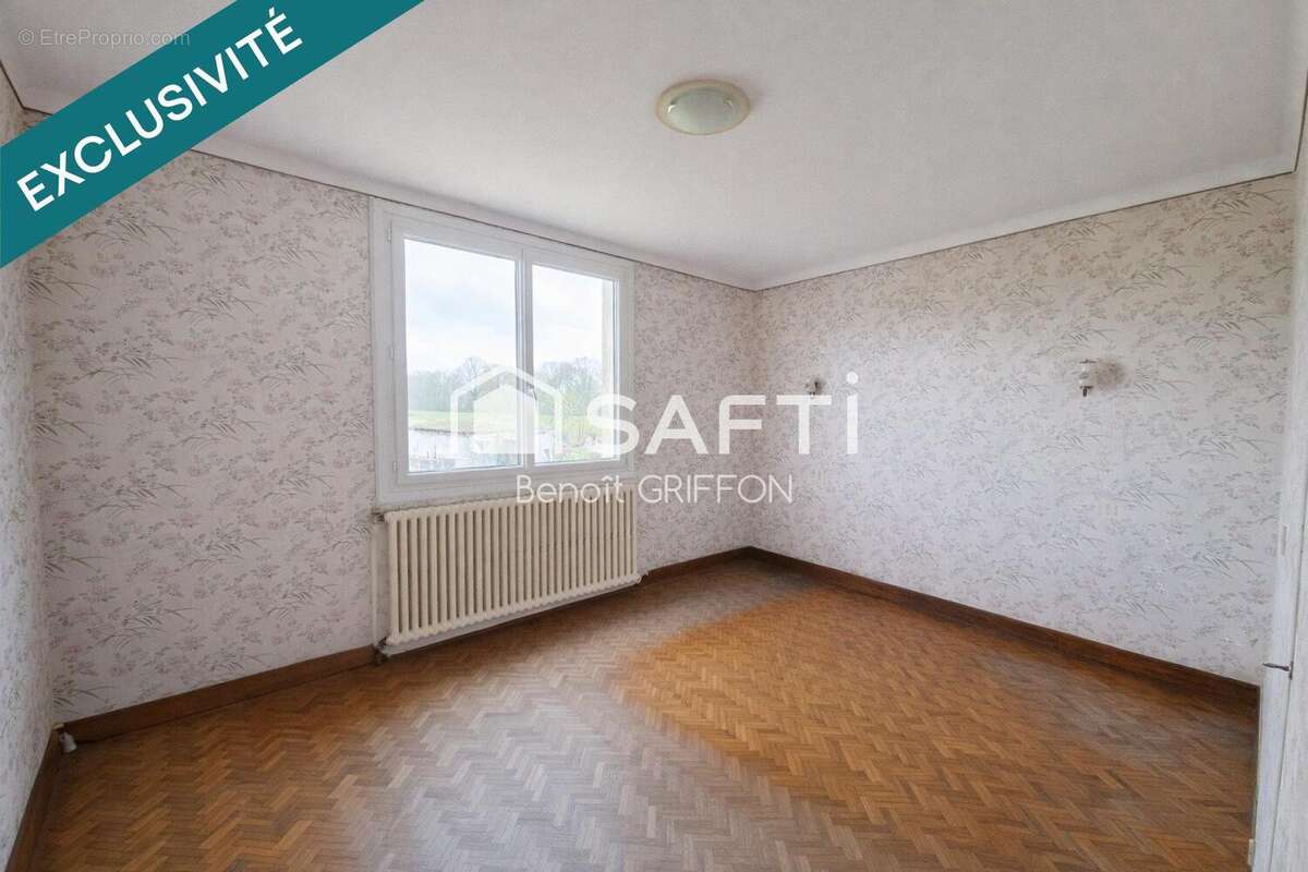 Photo 6 - Maison à LES LANDES-GENUSSON