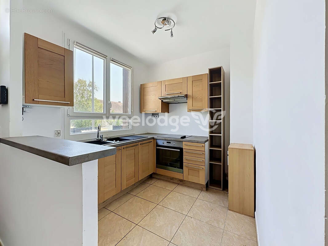 Maison 92 m² à Osny  - photo 5