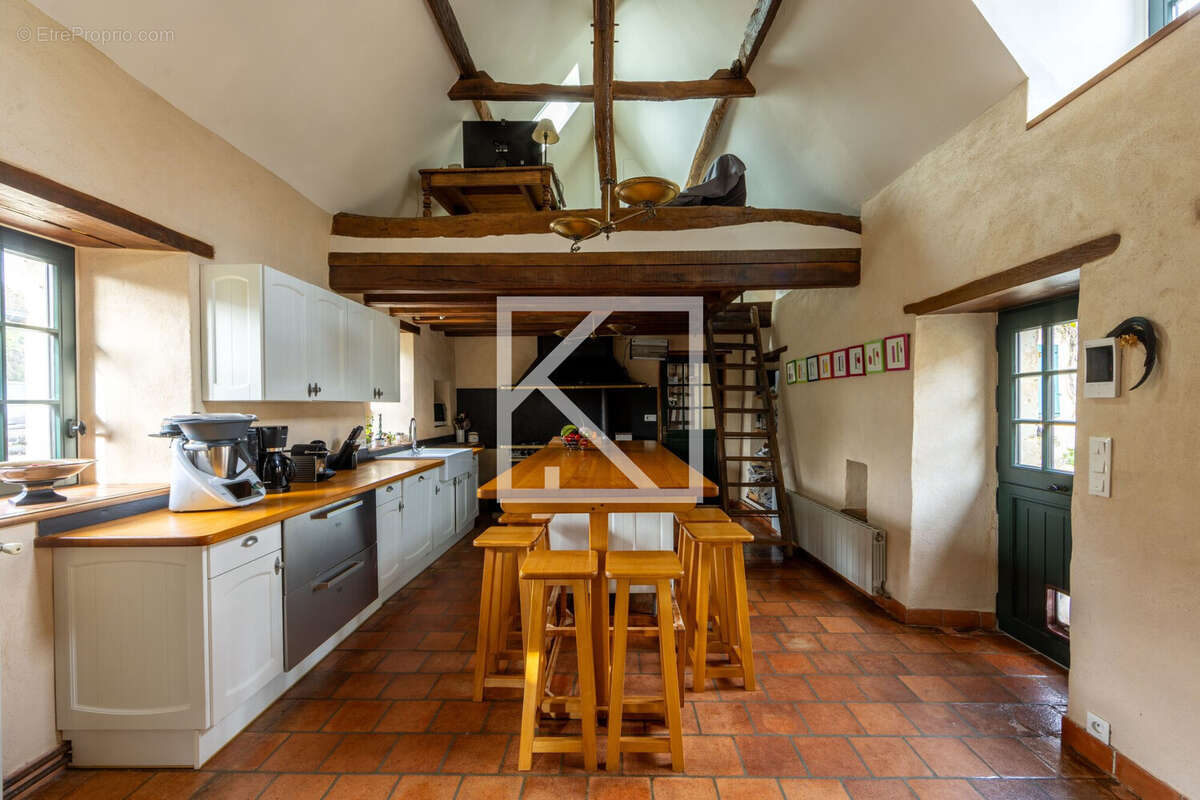 Maison à CHEVILLE