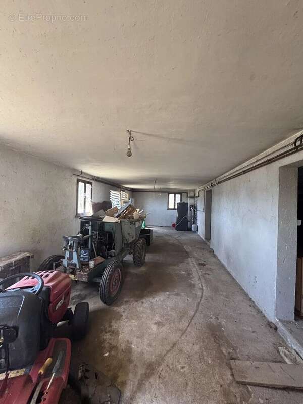 Maison de plain pied avec sous sol semi enterré - photo 10