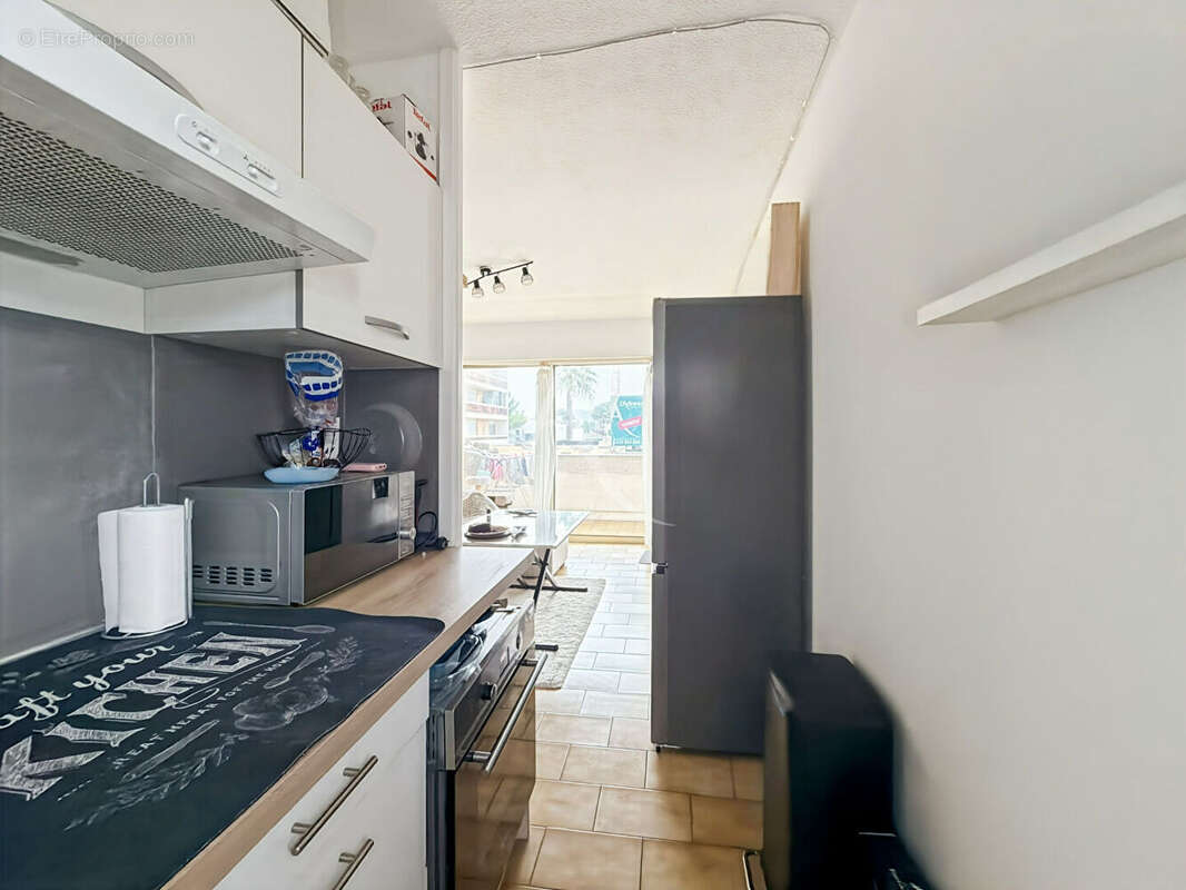 Appartement Le Cannet 1 pièce 27.41 m2 terrasse ouest cave commerces - photo 10