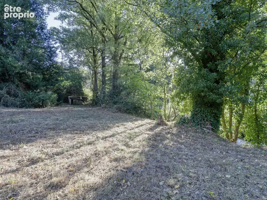 Maison 3 chambres avec grande terrasse et terrain de 2 300 m² bordé par une rivière - photo 14