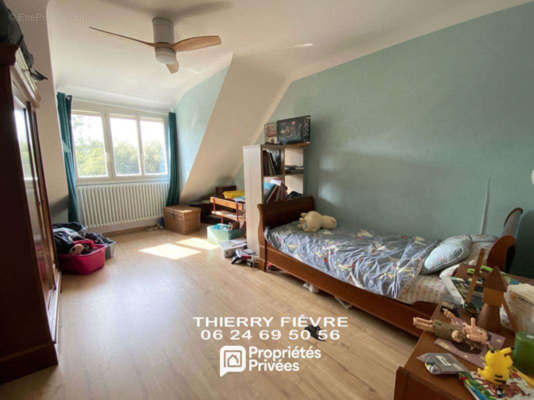 A VENDRE MONTREUIL BELLAY 49260 Maison de 151 m2  4 chambres sur terrain clos avec véranda cave - photo 11