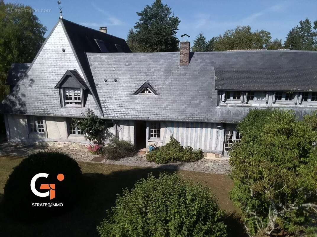 Maison à SAINT-OUEN-DE-THOUBERVILLE