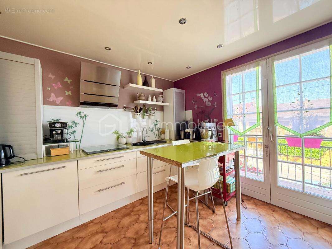 Maison spacieuse avec terrasse et jardin dans un cadre serein - photo 9
