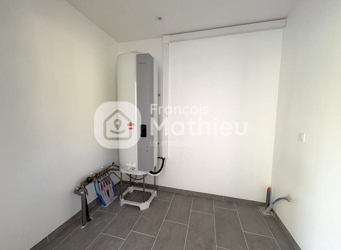 Saint-André-le-Bouchoux - Maison neuve de plain-pied sur 503 m2 de terrain - photo 12