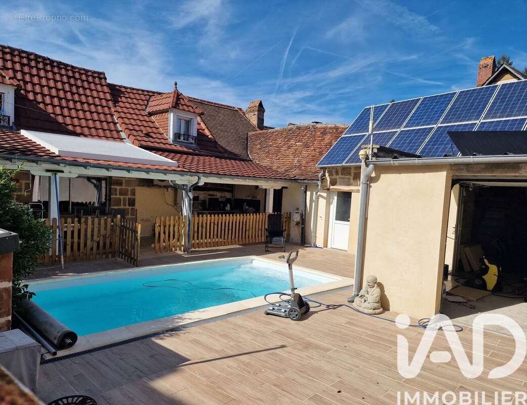 Photo 1 - Maison à BRIGNAC-LA-PLAINE
