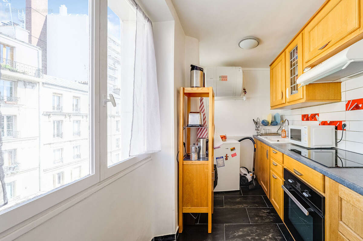 Appartement Paris 2 pièce(s) 36 m2 - photo 8