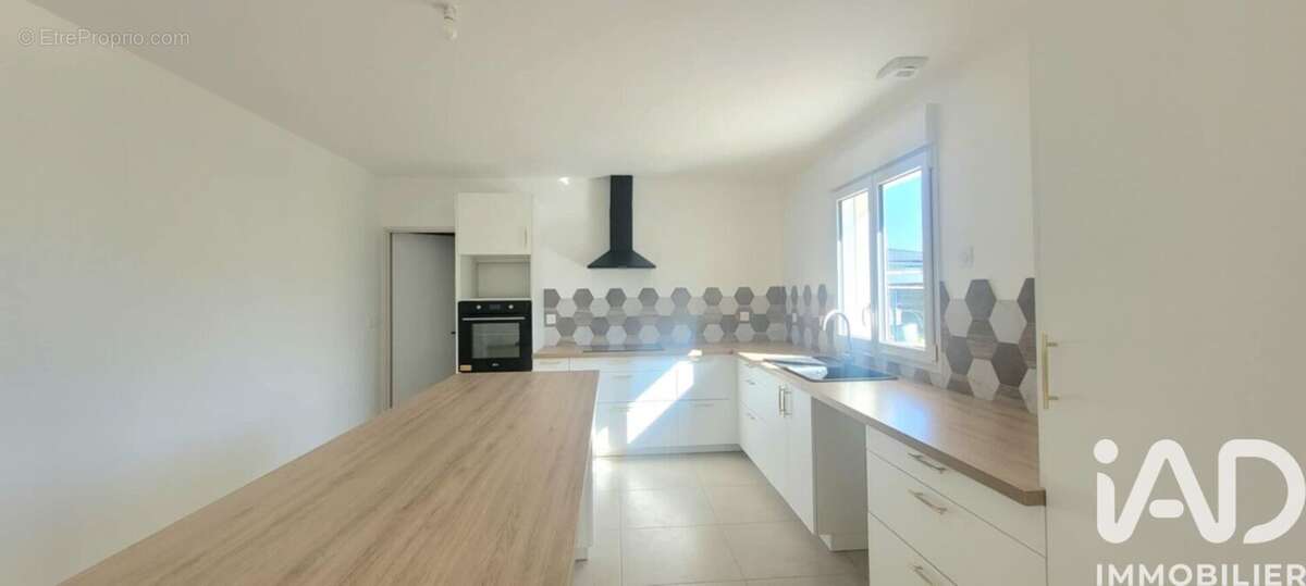 Photo 2 - Maison à NIEUIL-L'ESPOIR
