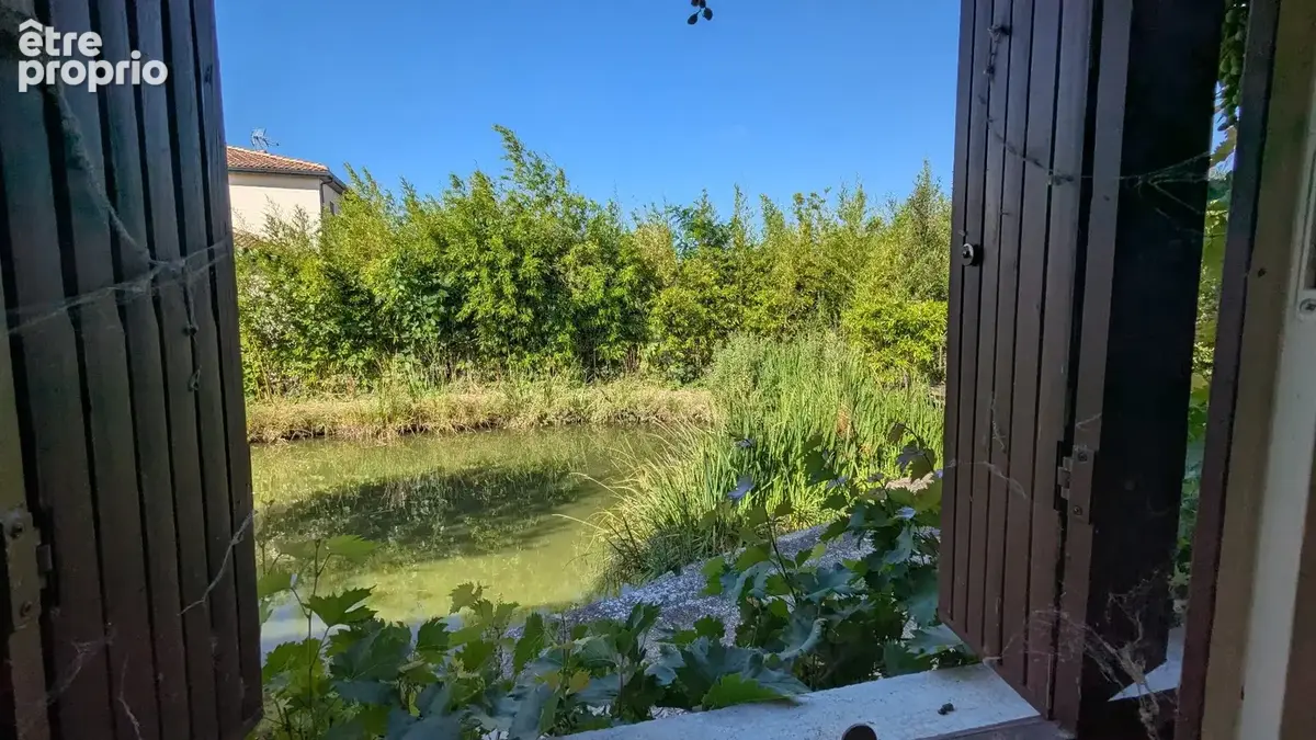 Maison T3 avec grand terrain arboré et grand plan d'eau - photo 10