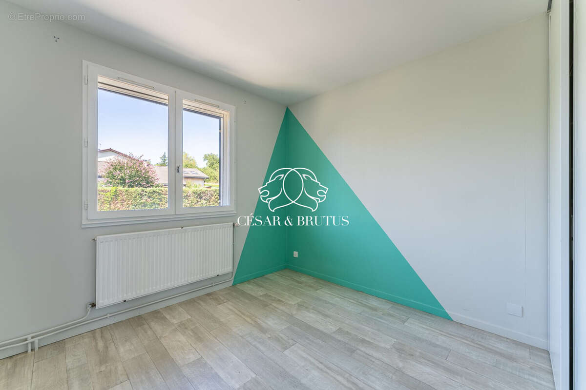 Maison 128 m² à Charvieu-Chavagneux  - photo 4