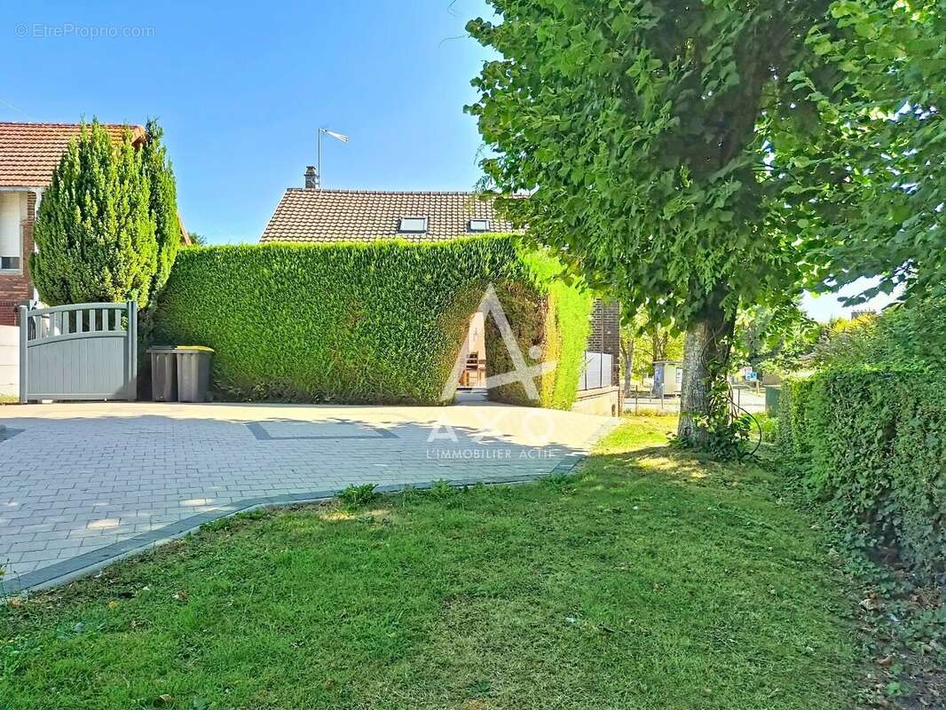 Maison en brique à Auneuil avec 2 chambres, véranda et jardin clos - photo 11
