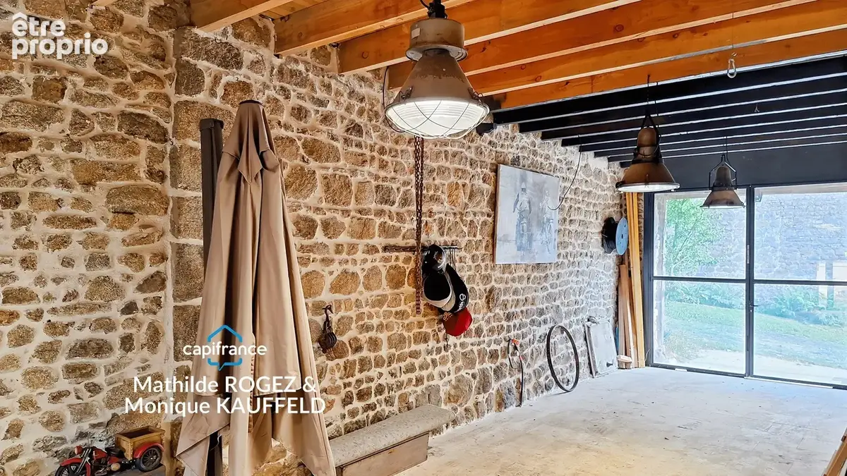 Cunlhat – belle maison en pierres rénovée – jardin 500 m² – grange - photo 17