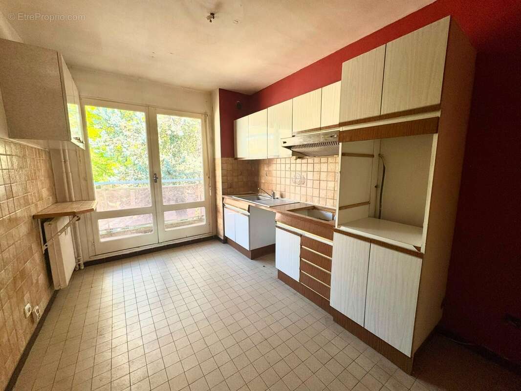 FIRMINY – Appartement T4 de 95,44 m² avec garage, cave et trois balcons - photo 3