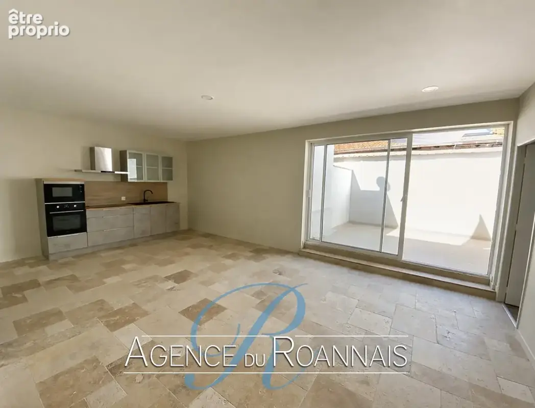 Maison type loft à vendre à ROANNE avec 4 chambres, cour et garage - photo 5