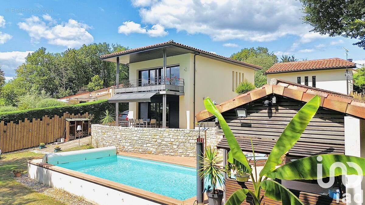 Photo 1 - Maison à PUY-L'EVEQUE