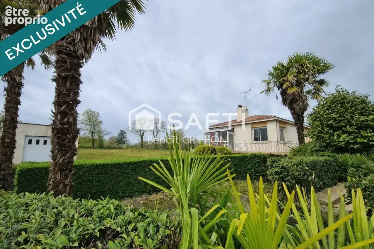 Photo 1 - Maison à LES LANDES-GENUSSON