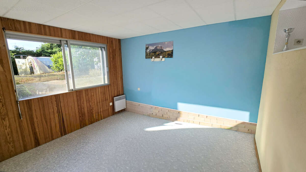 Maison  plain-pied 94 m2 / 4 chambres  / garage/ véranda/ jardin clos et paysager - photo 15