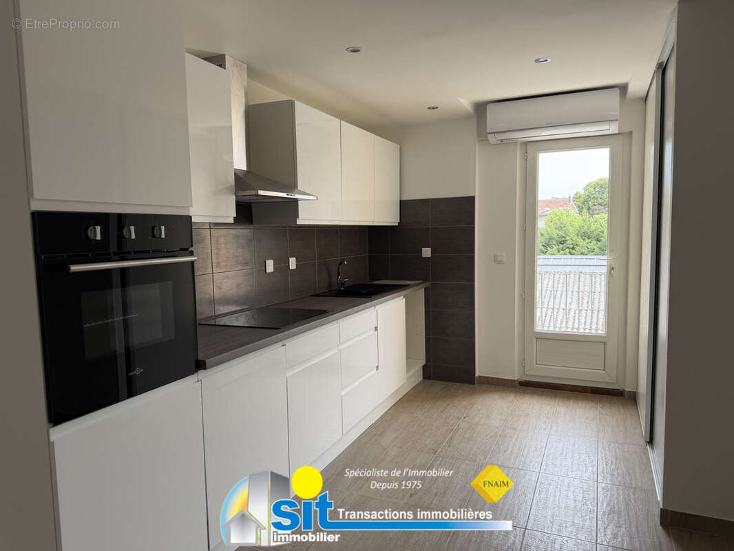 Appartement - 58,14m2 - 3 pièces - photo 2