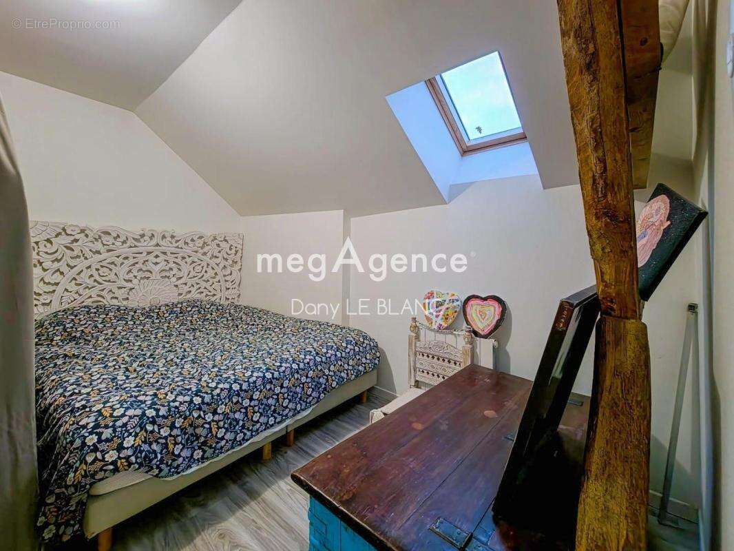 Ensemble immobilier – 4 appartements + maison + grange - photo 11