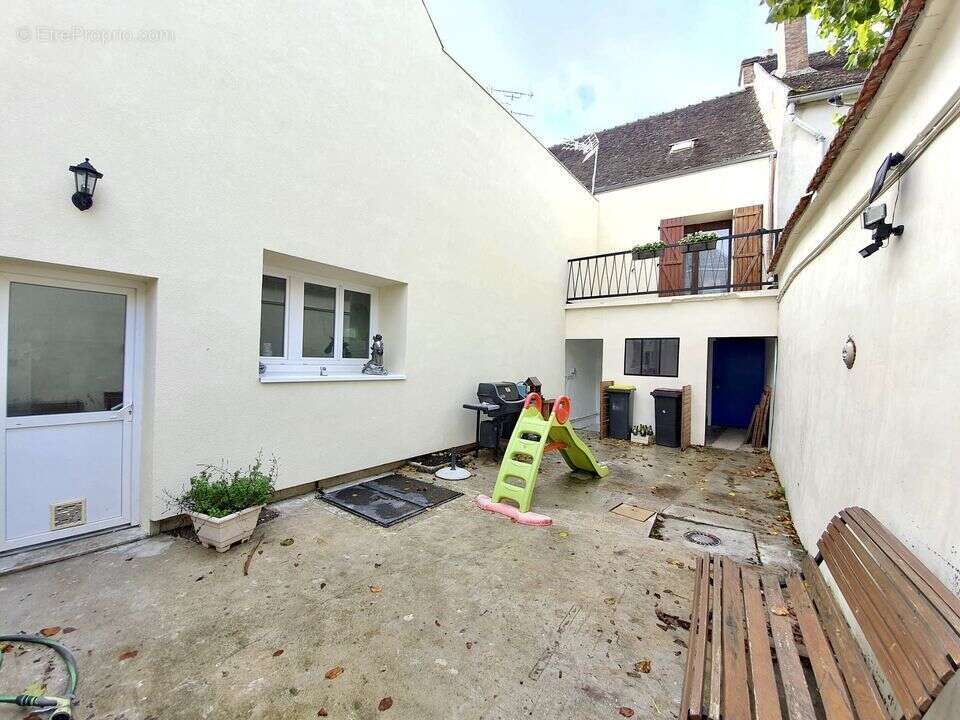 Maison d'habitation et local commercial - photo 3