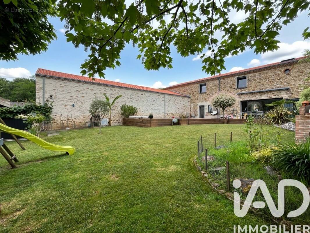 Photo 1 - Maison à BOUGUENAIS