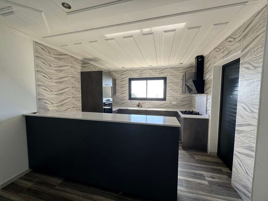 Maison 120 m² à Saint-Paul  - photo 7