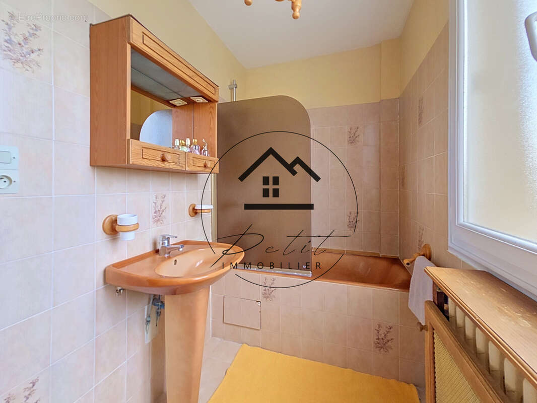 Maison familiale de 107 m2 avec 4 chambres et sous-sol total - photo 7