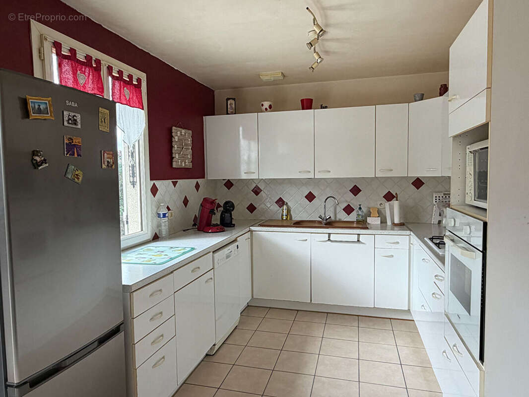 Maison Caudebec Les Elbeuf 4 pièce(s) 104 m2 DPE C - photo 4
