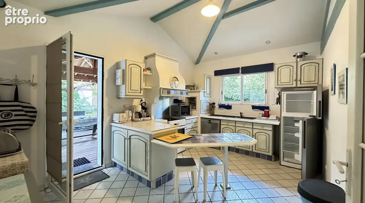 Entre Forêt Landaise et Art de Vivre  Ensemble de deux maisons sur 1638 m² de terrain boisé. - photo 7