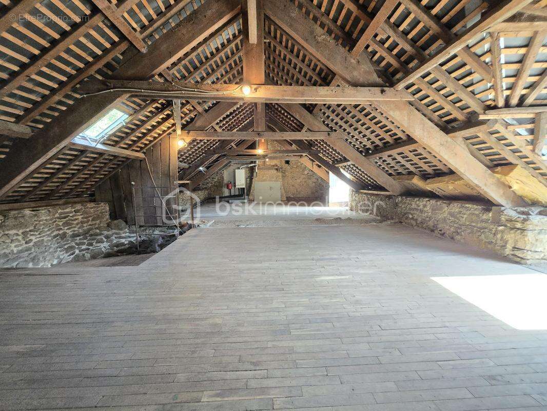 À Dinan, dans le secteur recherché de Léhon, maison de ville en pierre avec garage et courette - photo 13